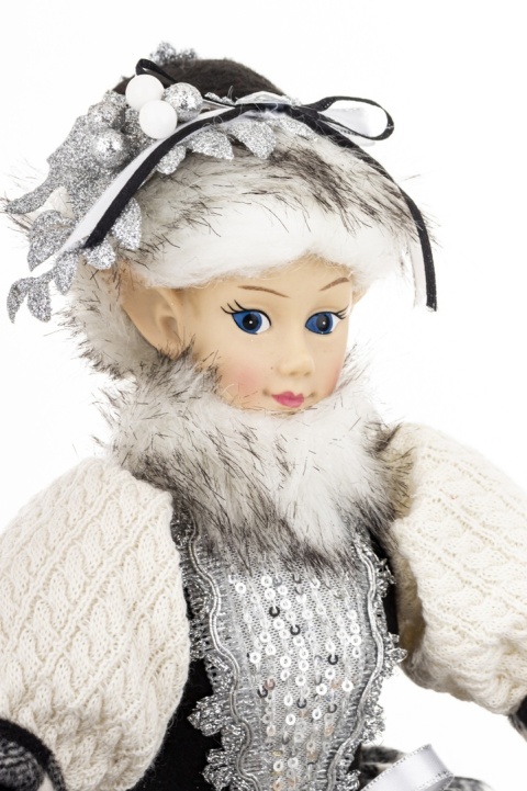 Elf sitting in a checkered coat (174416)