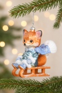 Glass ornament: Little fox on a sled (124024)