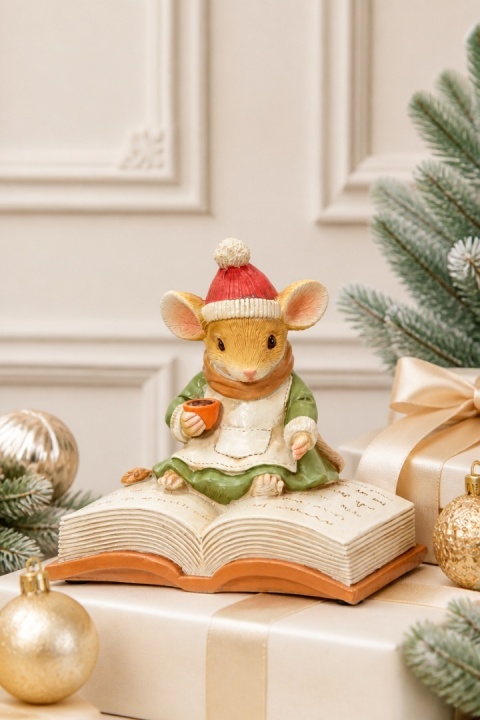 Polyresin mouse sitting on a book (703710)