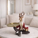 Red sitting reindeer with a gold tray, polyresin (2835)