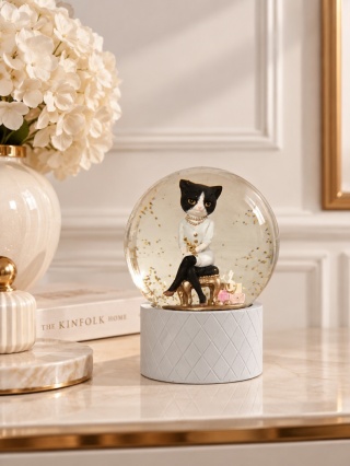 Water globe (10 cm dia.) with a stylish cat, light blue base (703631)