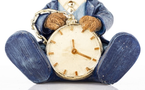 Teddy bear with a watch sitting in a blue suit, polyresin (180943)